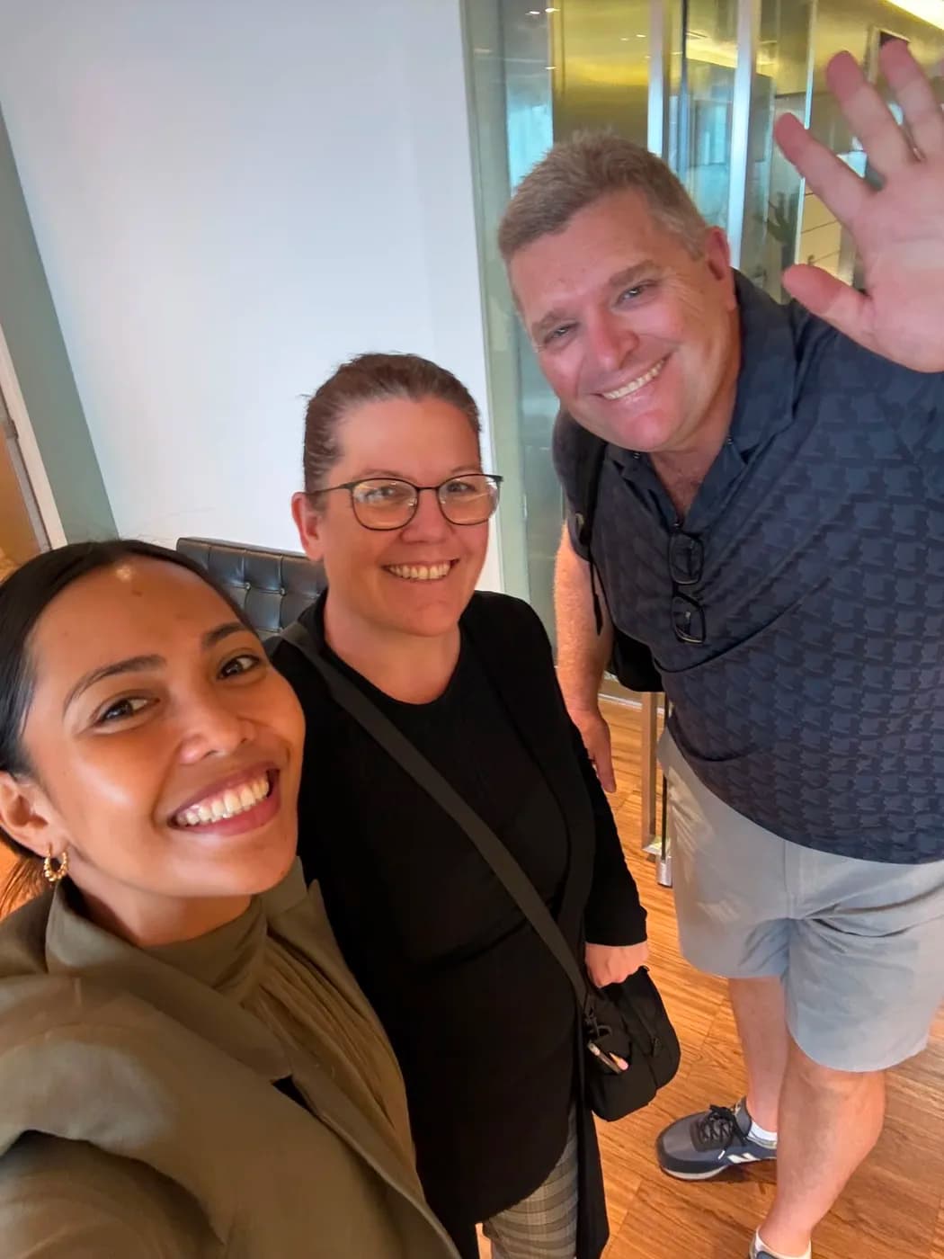A founder meeting members of their Philippines team in person