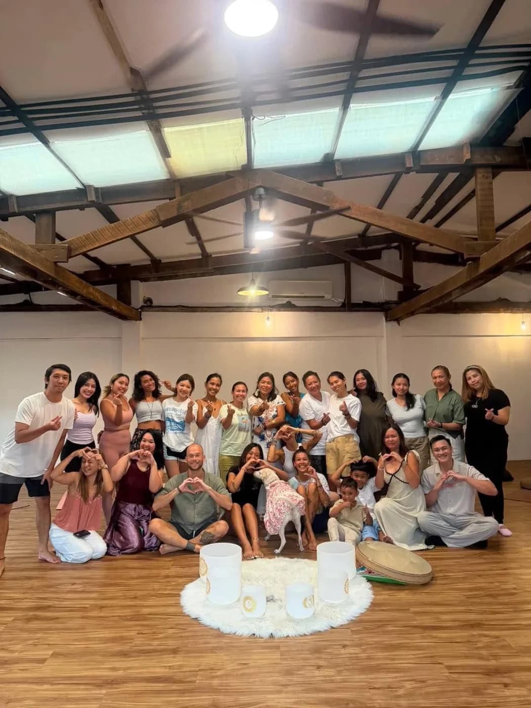 A group gathered with Eiza after a guided reset session